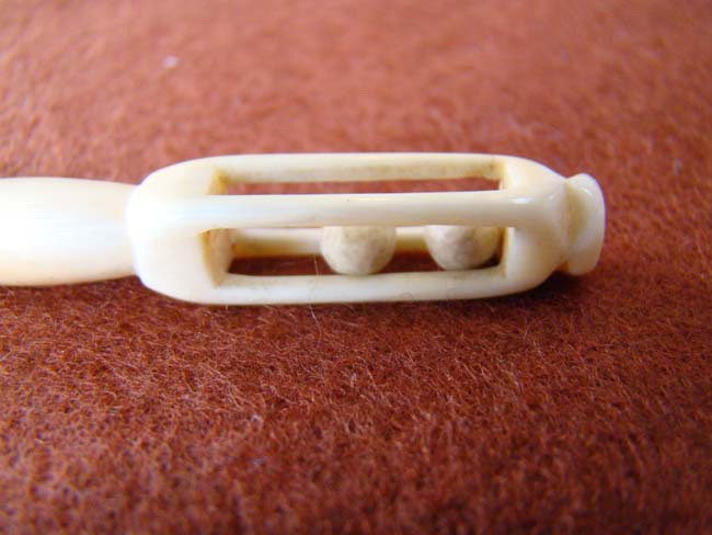 A 19th century sailor carved whalebone bodkin with cage handle — image 2